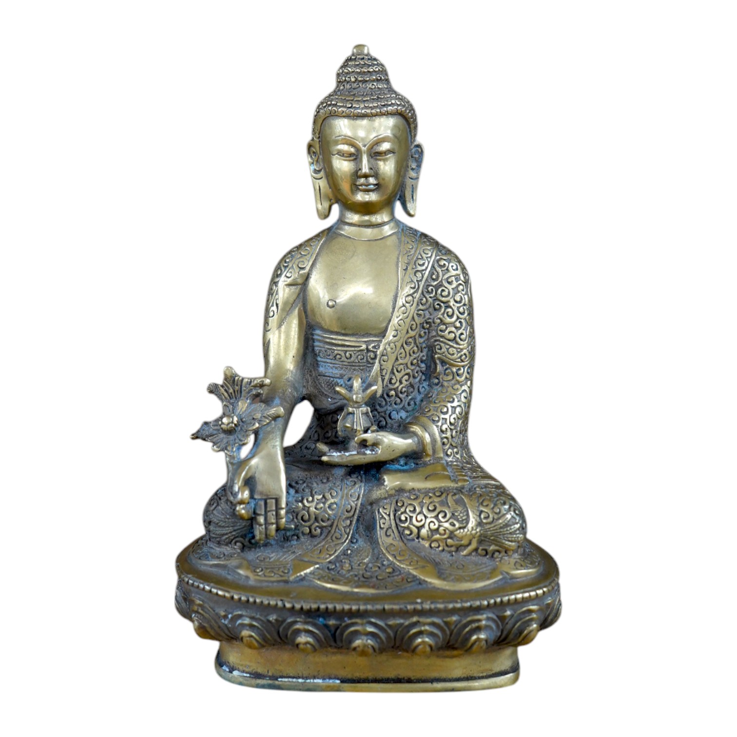 A Tibetan bronze model of a seated Buddha, 19cm. Condition - fair to good